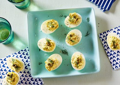 Deviled eggs with capers and dill