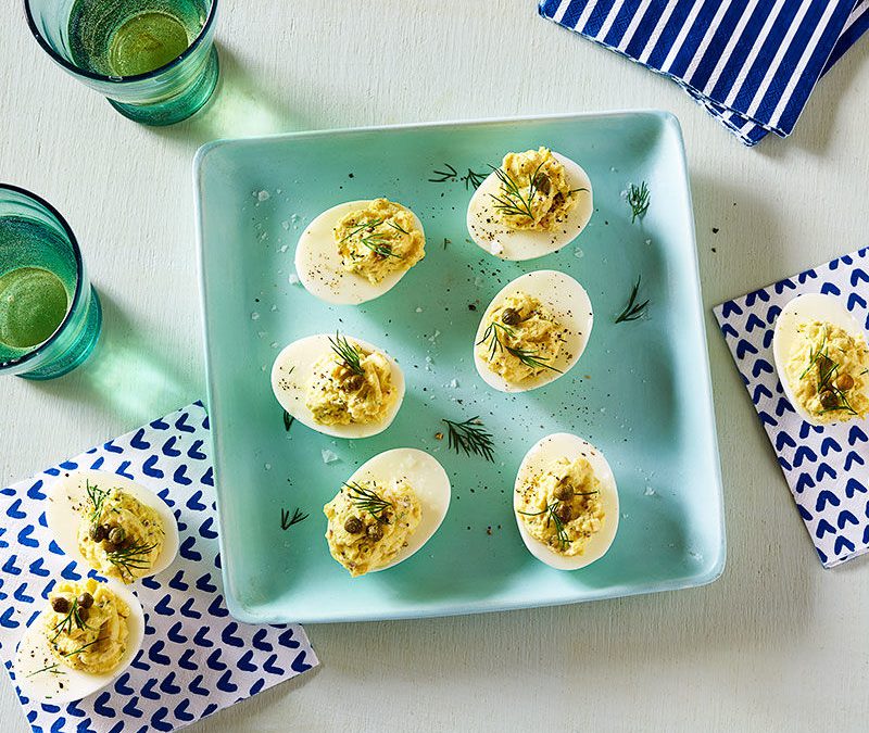 Deviled eggs with capers and dill