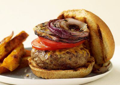 Cheeseburgers with grilled onions