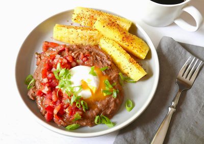 Refried beans with poached egg and pico