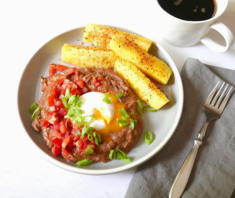 Refried beans with poached egg and pico